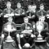Photo of Everton team from1891 wearing ruby-red shirts with light blue trim